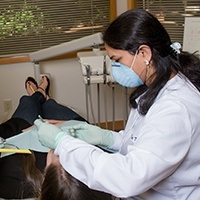 Dr. Taneja treatin patient