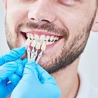 Man at consultation for dental bonding.