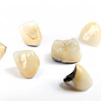 A series of dental crowns.