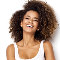 A young woman smiling