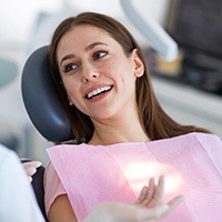 Smiling woman in dental chair