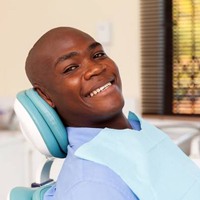 Smiling man in dental chair