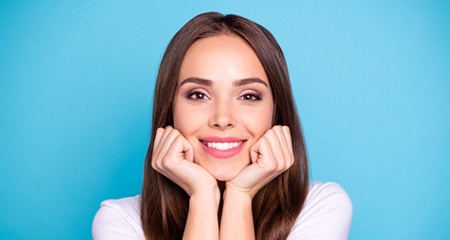 Woman smiling after receiving a smile makeover in Bellevue